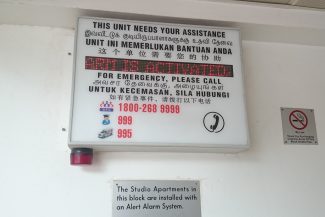 Alert alarm system under a studio apartment block